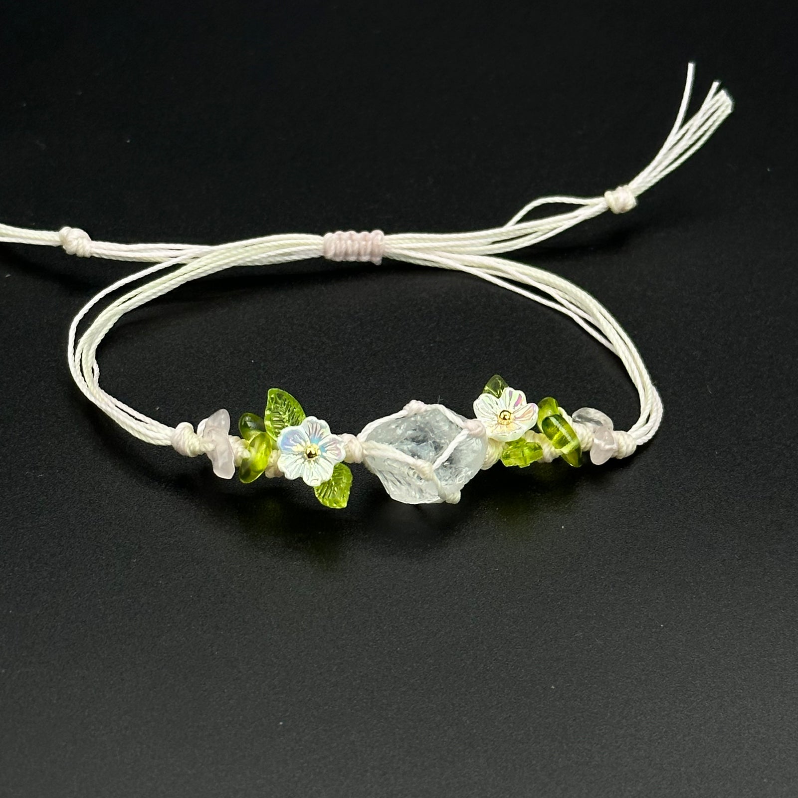 Spring Light bracelet with pale blue and clear crystal accents on a hand-braided cord