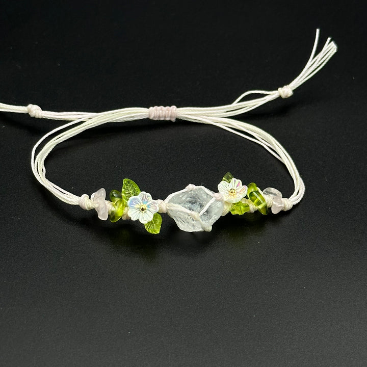 Spring Light bracelet with pale blue and clear crystal accents on a hand-braided cord